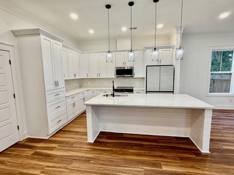 Furnished interior view inside a new home in , North Charleston (Image 13).