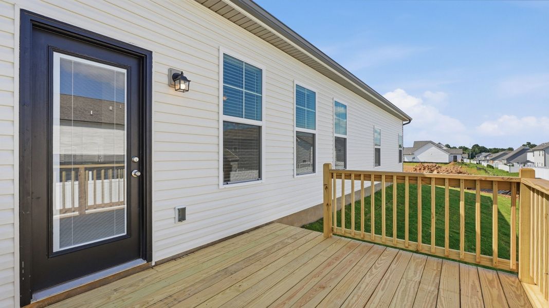 Exterior details and patio area of a home in Wheatfield, Shelbyville (Image 4).
