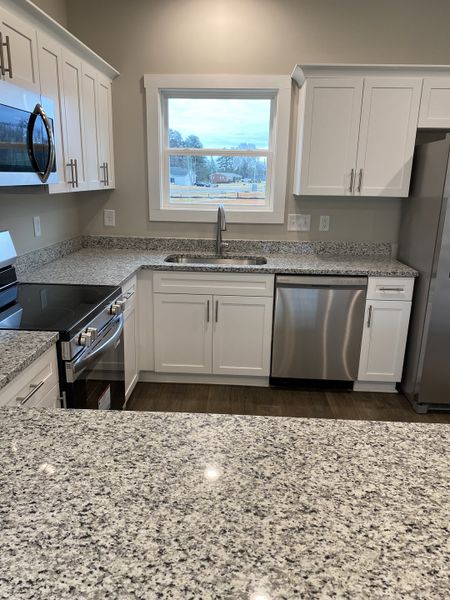 Representative furnished interior of a home built from the Washington by Foundation Home Builders LLC in Pinnix Loop, Burlington (Image 3).