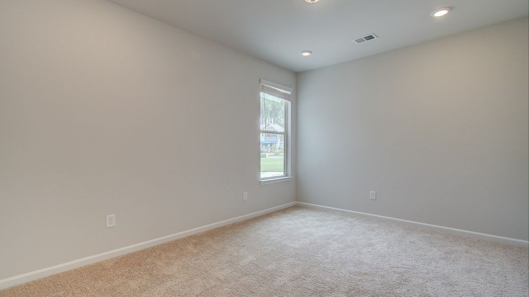 Representative furnished interior of a home built from the Meridian II by DRB Homes in Northcroft, Loganville (Image 15).