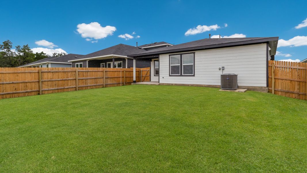 Representative exterior photo of a completed home built from the The Baxtor by D.R. Horton in Valverde, Bastrop, TX (Image 14).