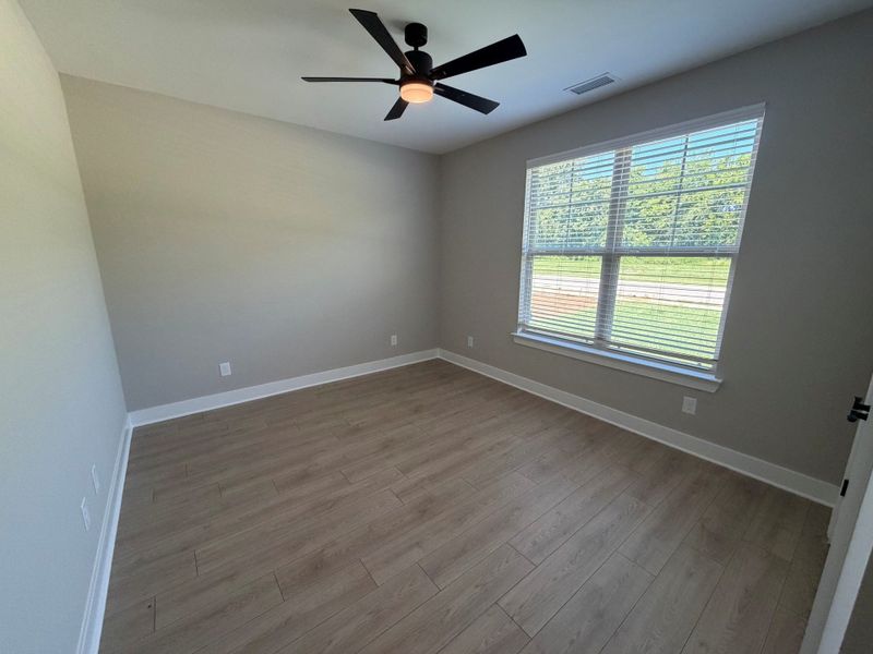 Spacious, unfurnished interior of a new home in Bluebird Hollow at Autumn Ridge, Spring Hill (Image 15).