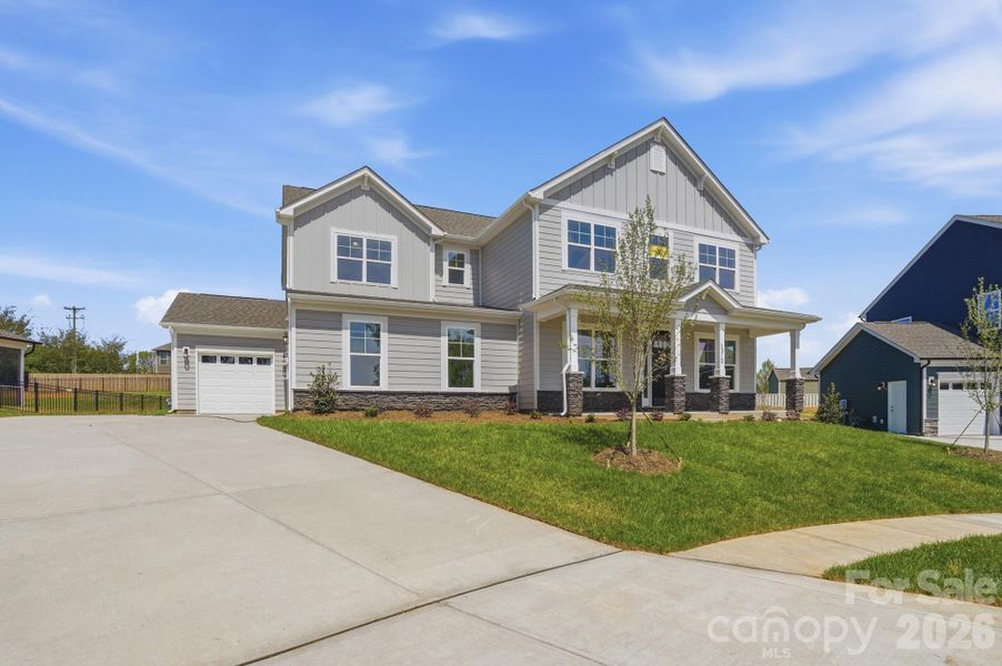 Front exterior of a new home in Robinson Oaks, Gastonia, NC, highlighting curb appeal (Image 2).