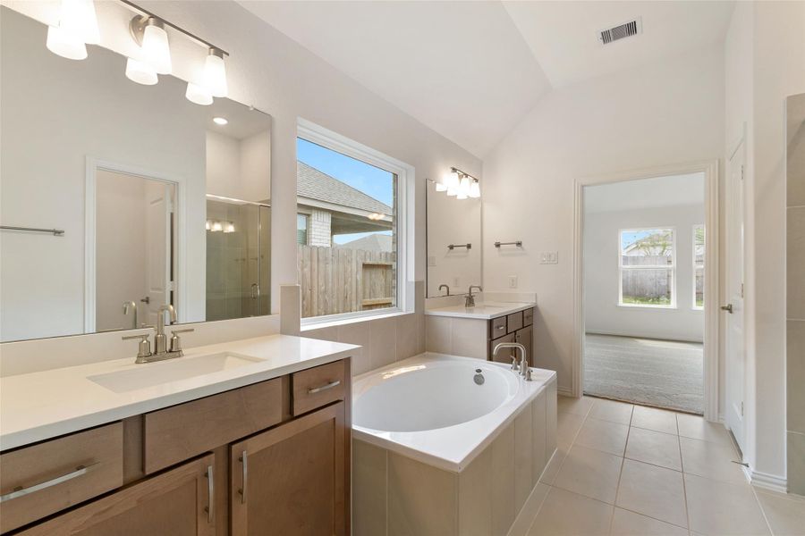 Furnished interior view inside a new home in Sunterra, Katy (Image 10).