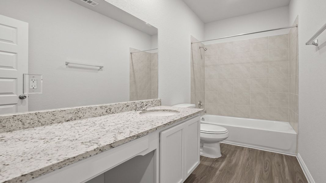 Furnished interior view inside a new home in Hunters Ranch, San Antonio (Image 5).