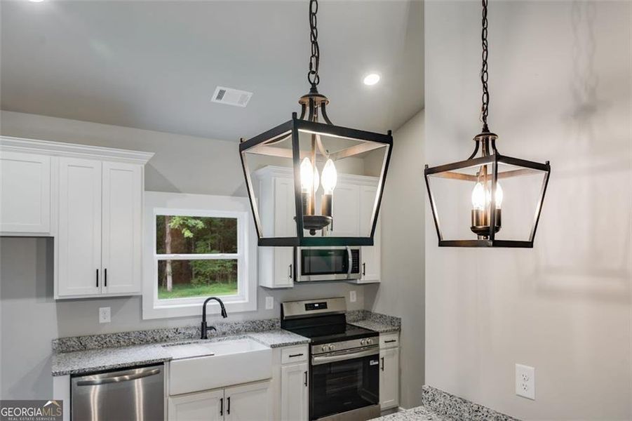 Furnished interior view inside a new home in , Buchanan (Image 11).