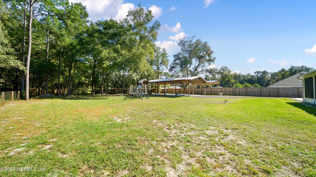 Exterior details and patio area of a home in , Keystone Heights (Image 4). Exterior details and patio area of a home in , Keystone Heights (Image 4).