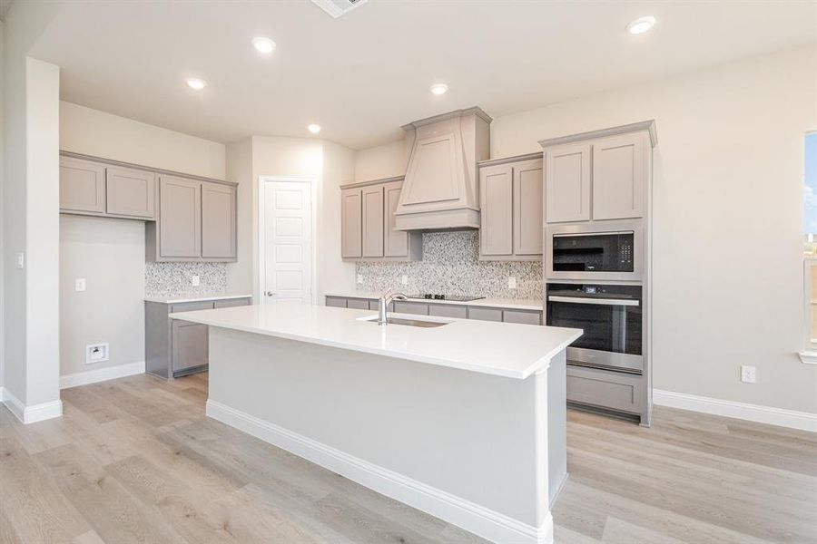 Furnished interior view inside a new home in Ten Mile Creek Estates, DeSoto (Image 14).