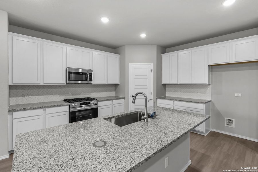 Furnished interior view inside a new home in Comanche Ridge, San Antonio (Image 26). Furnished interior view inside a new home in Comanche Ridge, San Antonio (Image 26).