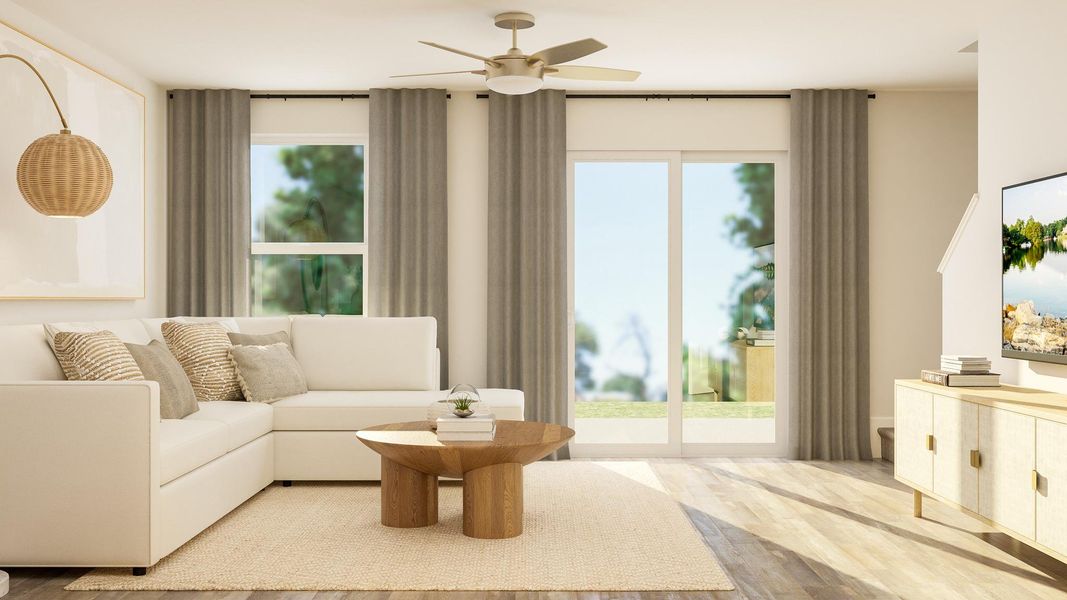 A living room with a large window. A living room with a large window.