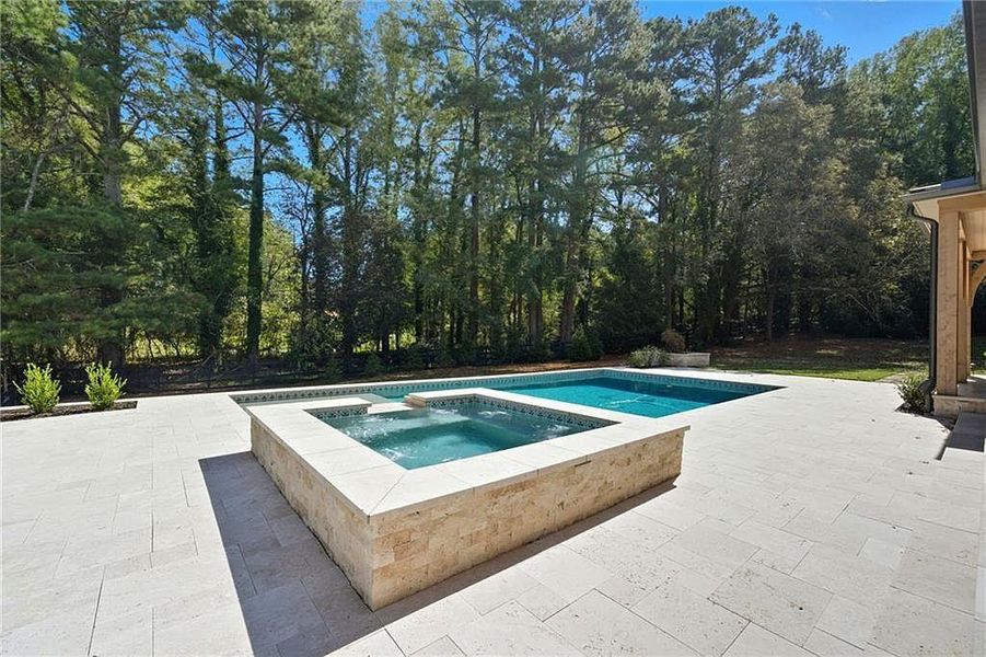 Exterior details and patio area of a home in Crossroads, Alpharetta (Image 34).