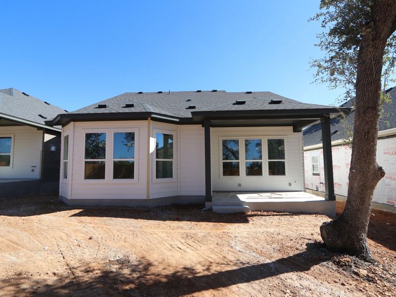 Exterior details and patio area of a home in Heritage, Dripping Springs (Image 2). Exterior details and patio area of a home in Heritage, Dripping Springs (Image 2).