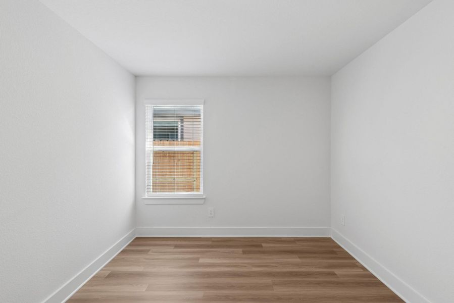 Spacious, unfurnished interior of a new home in Lone Star Landing, Montgomery (Image 42).