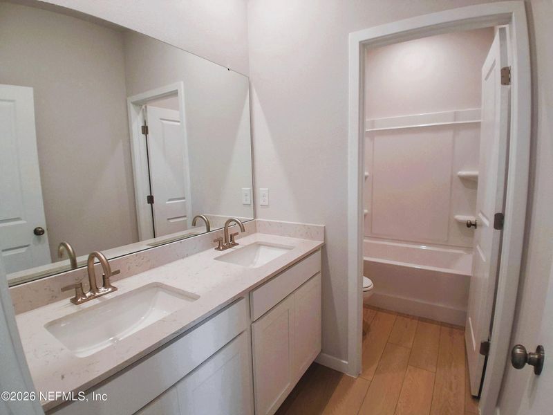 Furnished interior view inside a new home in Seminole Palms, Palm Coast (Image 12).