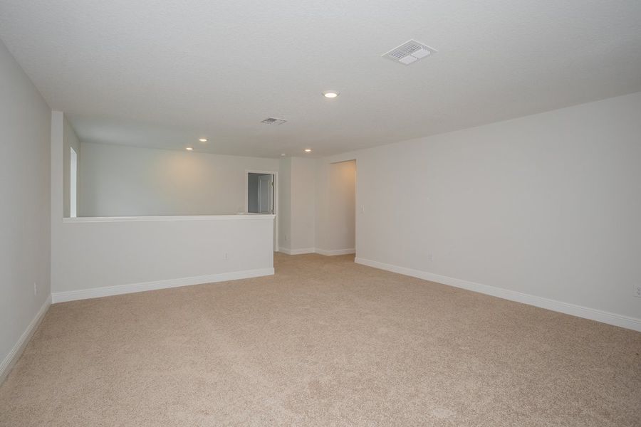 Representative unfurnished interior of a home built from the Anna Maria by Casa Fresca Homes in Mirada, San Antonio (Image 19).