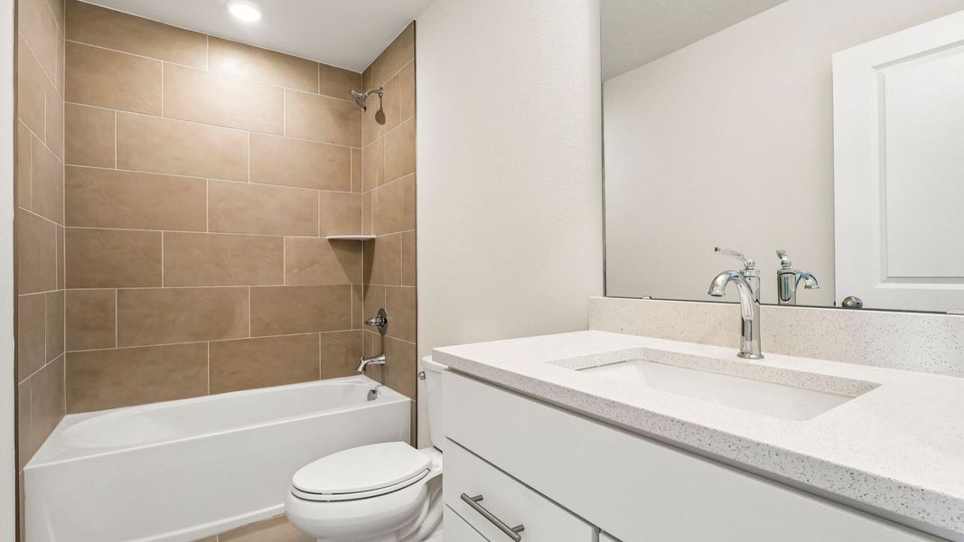 Furnished interior view inside a new home in Cyrene at Harmony, St. Cloud (Image 29).