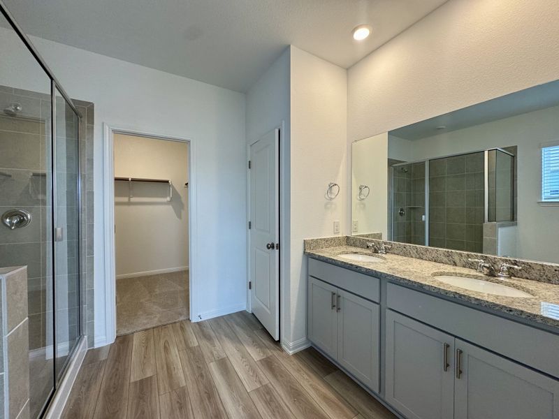 Furnished interior view inside a new home in Longview 40s - Alley, Del Valle (Image 4).