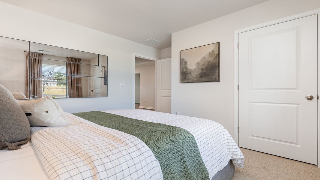 Furnished interior view inside a new home in The Meadows at Wildwood Village, Shallotte (Image 16).