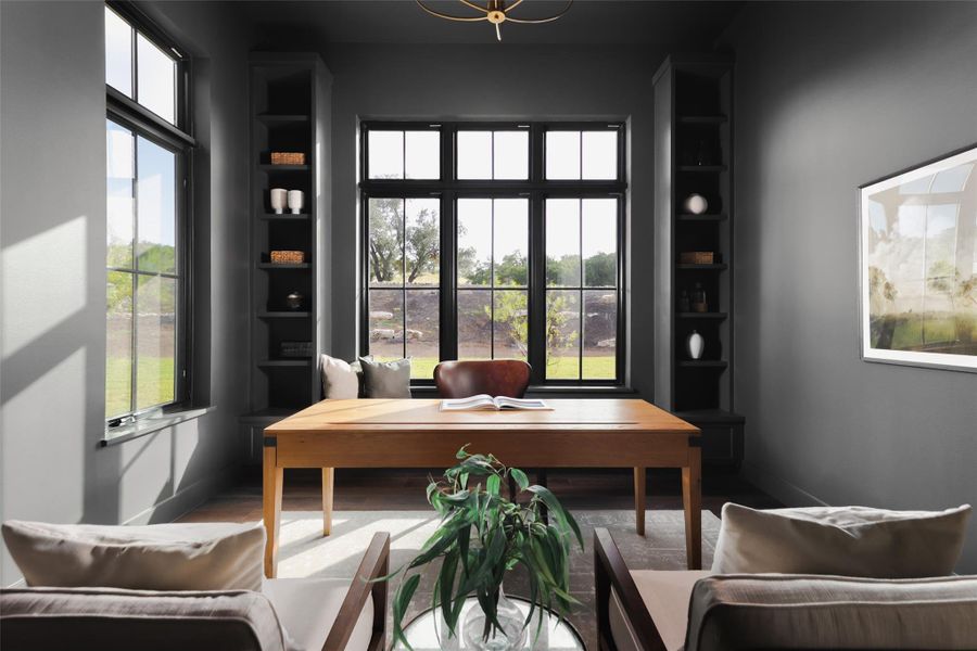 A quiet retreat for deep work. Located on the main level for easy access, this dedicated home office offers the physical separation needed for a productive workday. The layout is spacious enough for a large executive desk and additional seating, making it a true secondary sanctuary within the home.