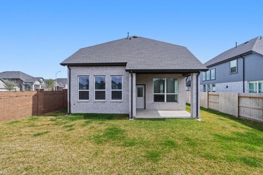 Exterior details and patio area of a home in , Cypress (Image 4).