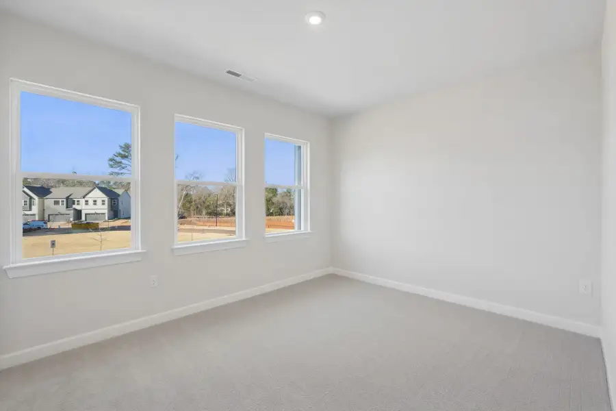 Spacious, unfurnished interior of a new home in Summit At Homestead, Chapel Hill (Image 12).