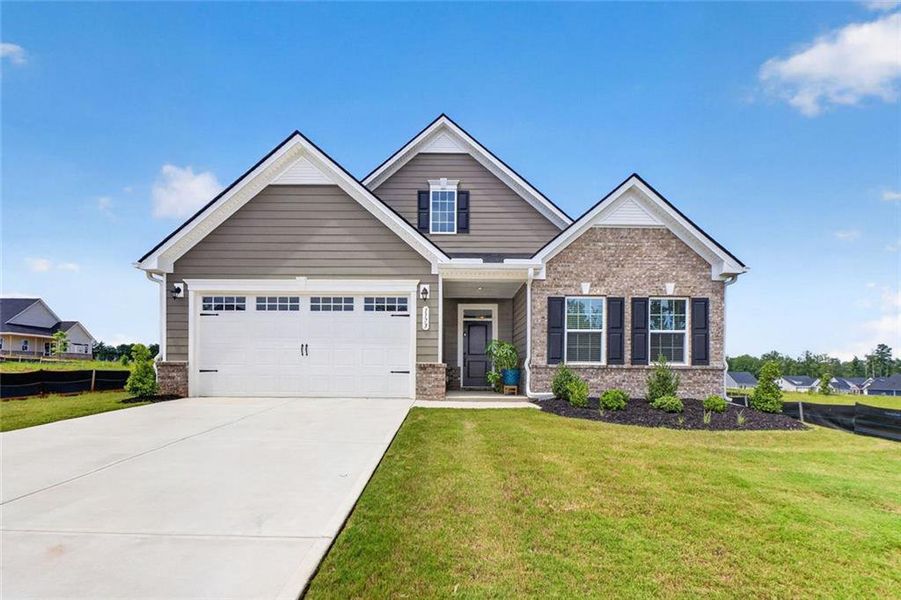Front exterior of a new home in , McDonough, GA, highlighting curb appeal (Image 25).