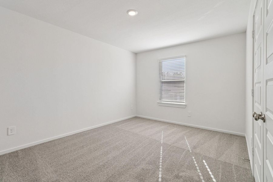 Spacious, unfurnished interior of a new home in Sundance Cove - Traditional Series, Crosby (Image 37).