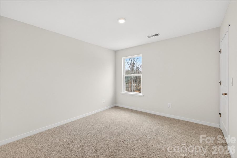 Spacious, unfurnished interior of a new home in Reedy Creek Preserve, Charlotte (Image 20).