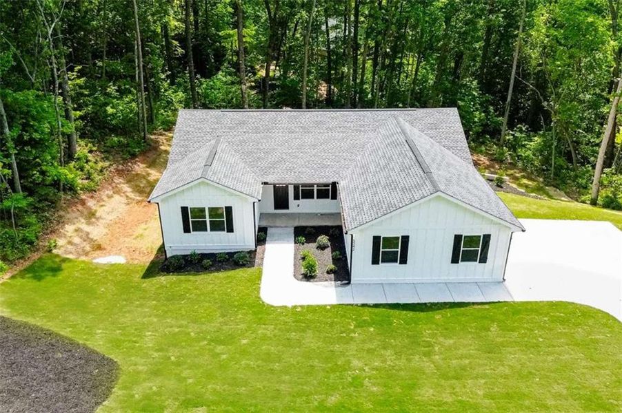 Front exterior of a new home in , Gainesville, GA, highlighting curb appeal (Image 1).