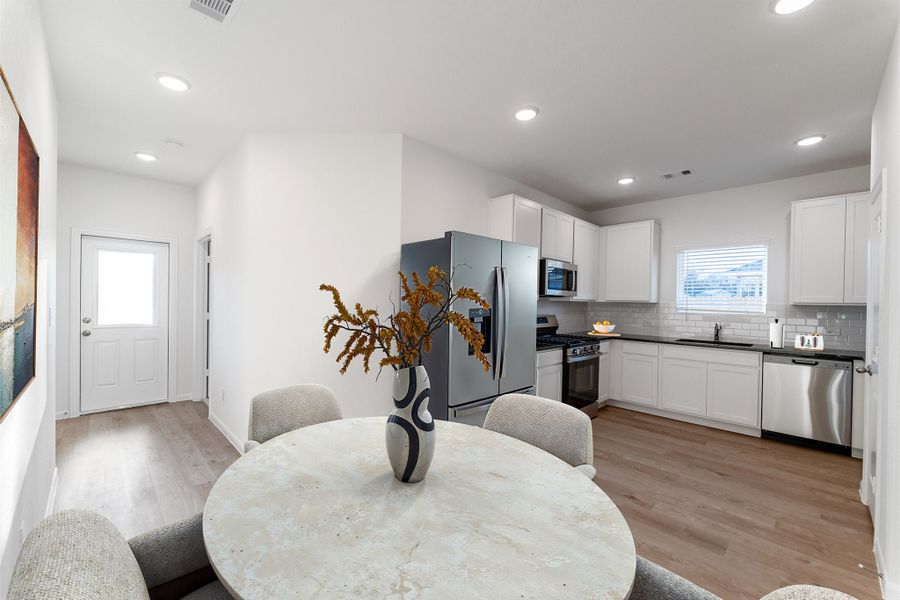 Furnished interior view inside a new home in Caney Mills, Conroe (Image 7).