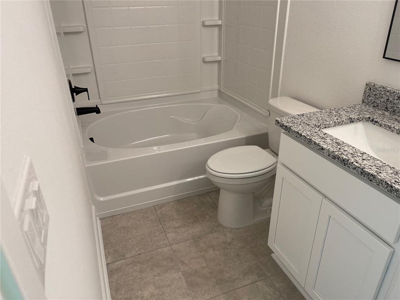 Furnished interior view inside a new home in Harmony Central, St. Cloud (Image 5).