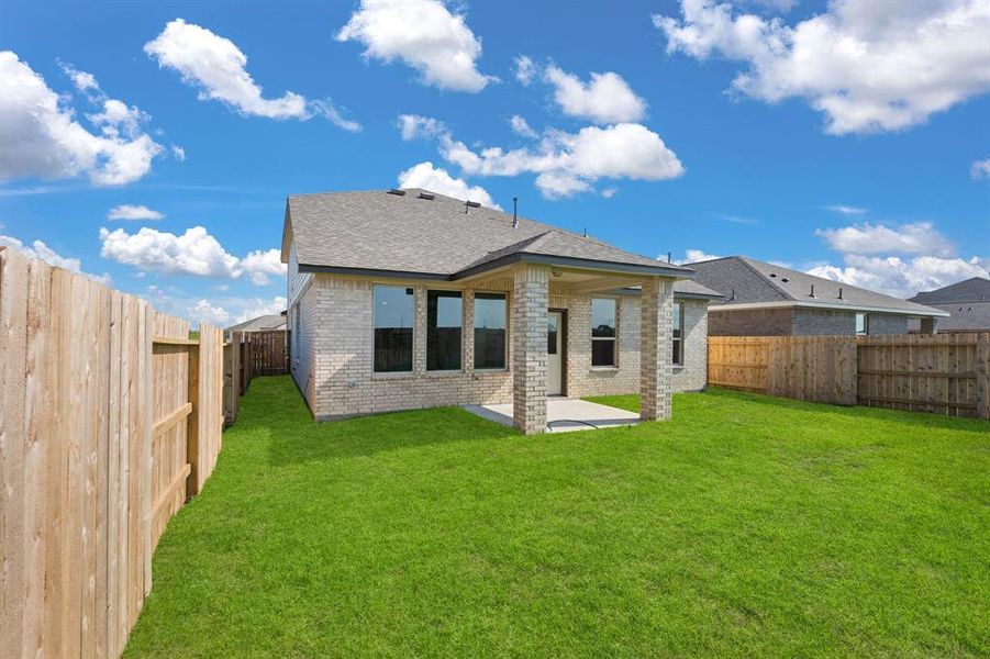 This backyard is perfect for family gatherings, social events, or simply unwinding in the fresh air.