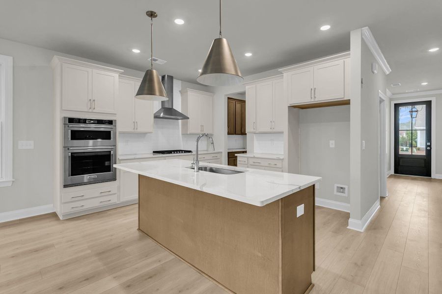 Furnished interior view inside a new home in Tidewater at Lakes of Cane Bay, Summerville (Image 8).