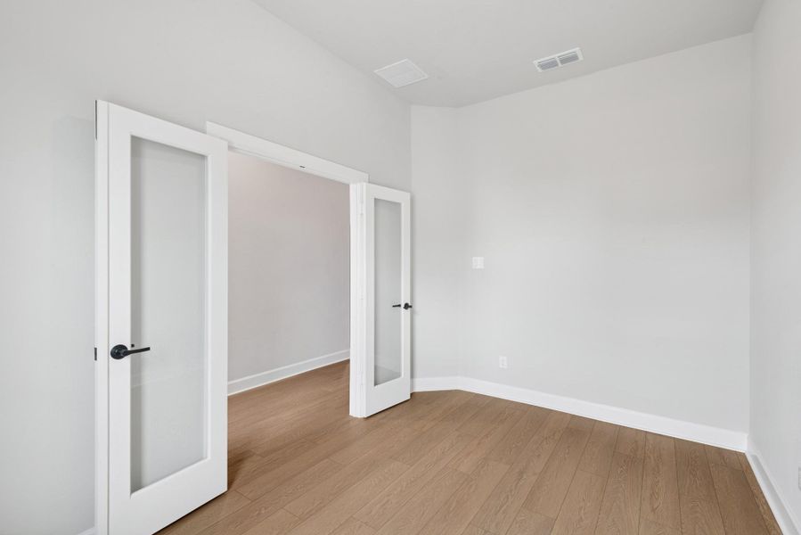 Spacious, unfurnished interior of a new home in Meridiana 55' Homesites, Manvel (Image 11).