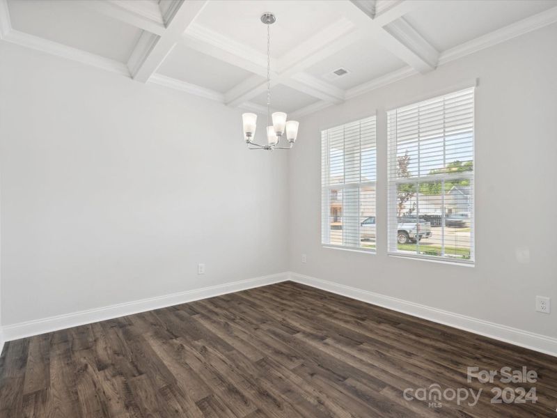 PHOTO REPRESENTATION ONLY. Dining room shown with coffered ceiling than is not included.