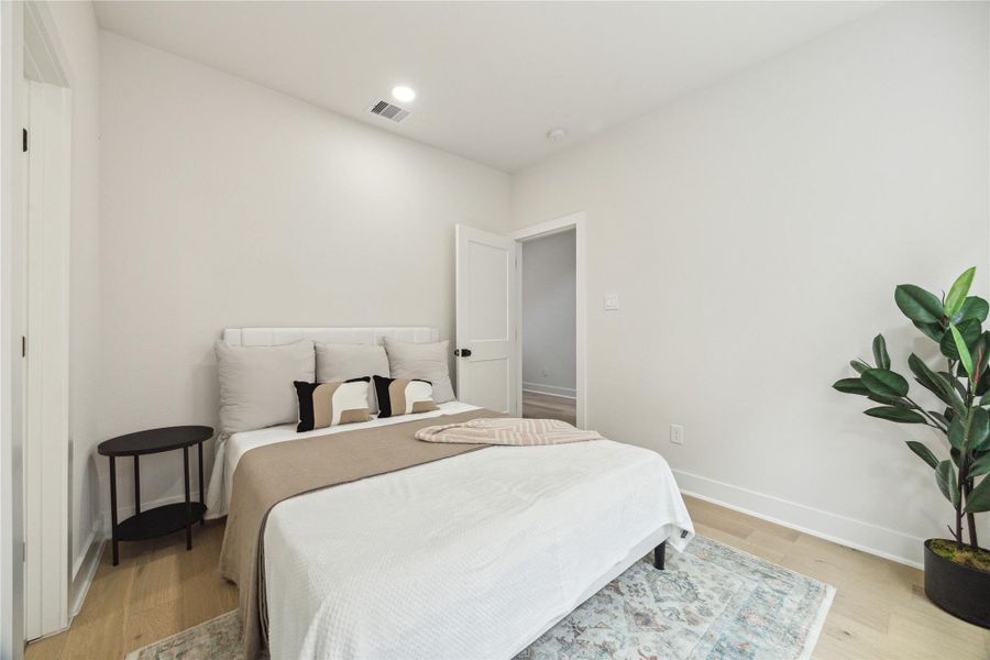 Cozy first-floor bedroom with modern finishes and convenient access. Perfect for guests or a private retreat.