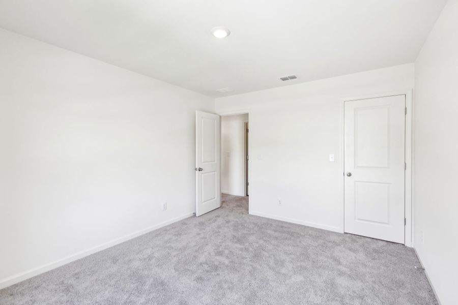 Representative unfurnished interior of a home built from the Galileo by Starlight Homes in Rolling Glen, Hutto (Image 24).