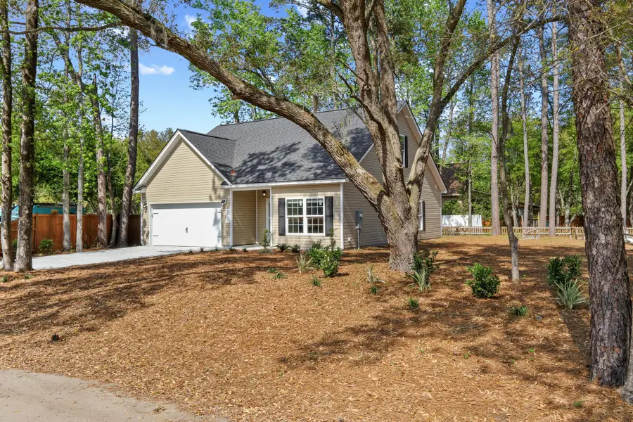 Exterior details and patio area of a home in , Johns Island (Image 19). Exterior details and patio area of a home in , Johns Island (Image 19).