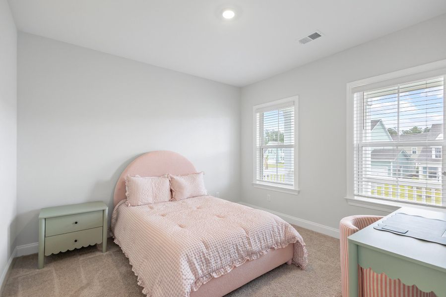 Furnished interior view inside a new home in Tidewater at Lakes of Cane Bay, Summerville (Image 41).