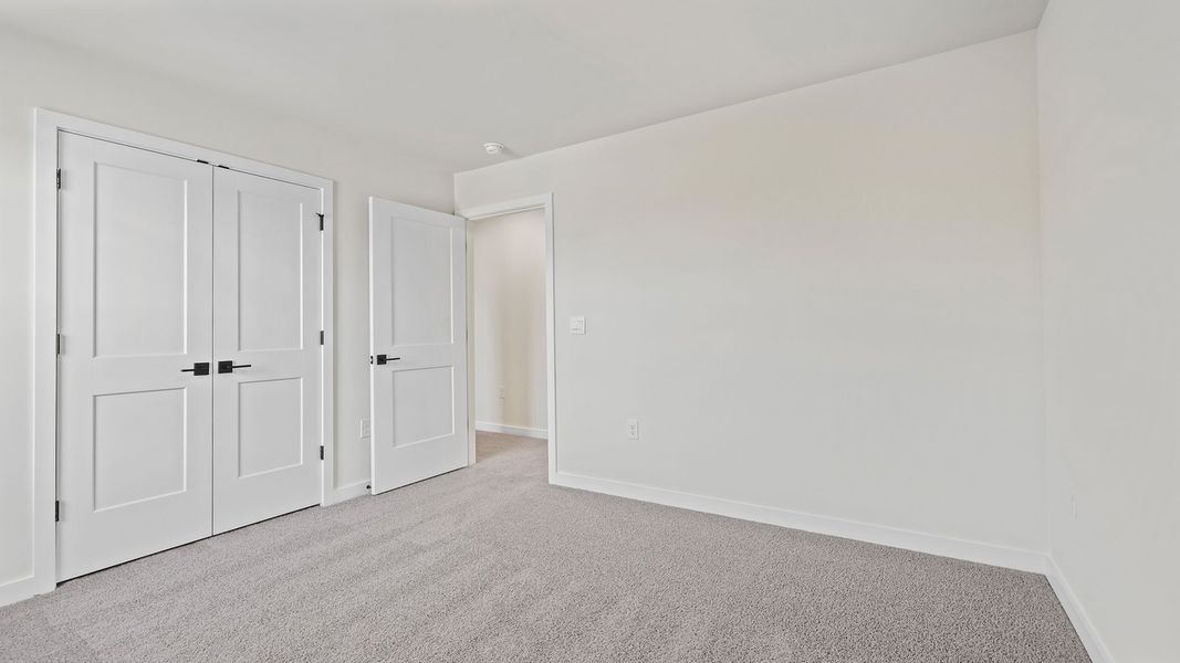 Spacious, unfurnished interior of a new home in Adams Glen, Greenville (Image 25).
