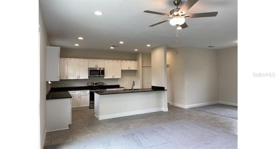 Furnished interior view inside a new home in , North Port (Image 4).