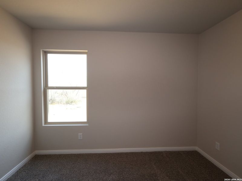 Spacious, unfurnished interior of a new home in Chaparral Ranch, Floresville (Image 30).