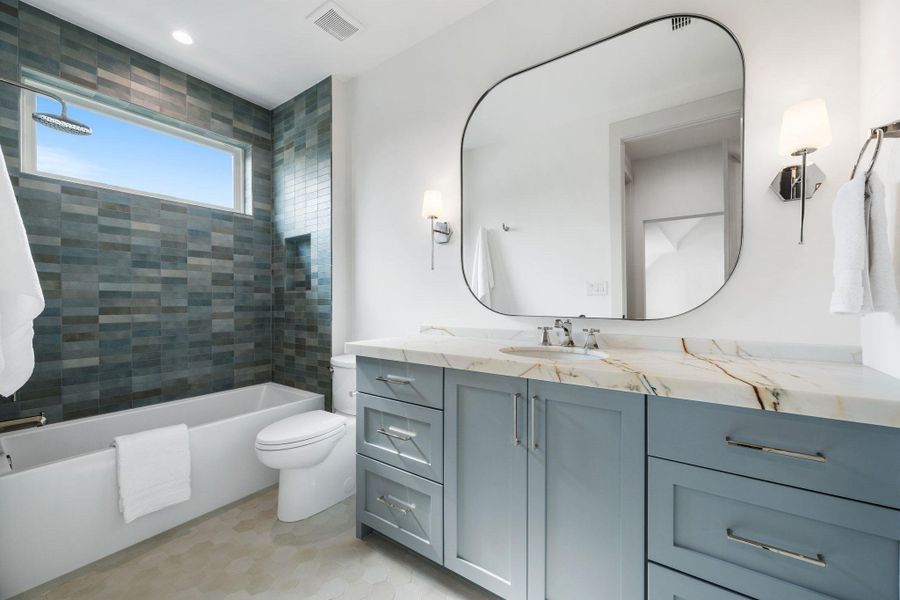 Bathroom with shower / bath combination and vanity Bathroom with shower / bath combination and vanity