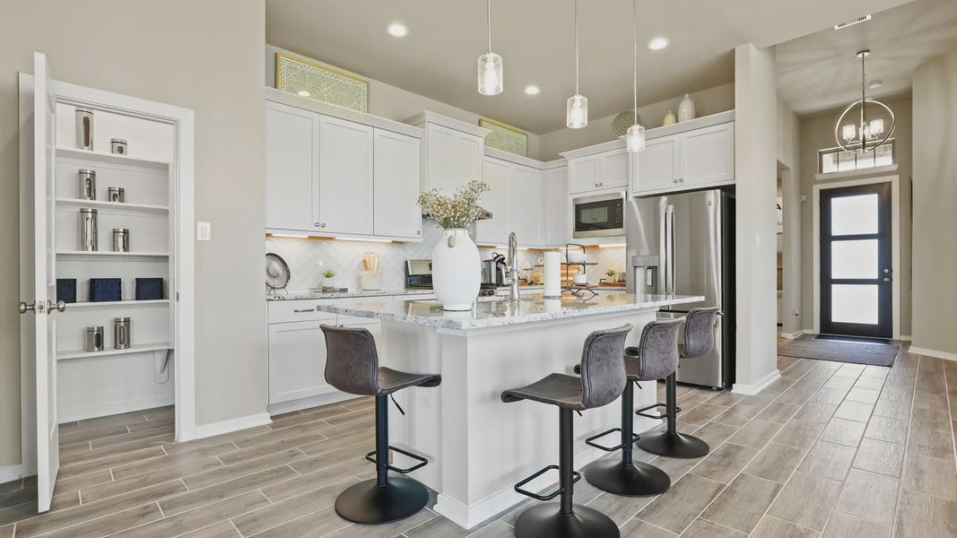Representative furnished interior of a home built from the Oxford by Chesmar Homes in Bridgeland 45's, Cypress (Image 9).