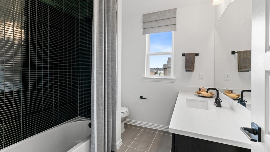 Representative furnished interior of a home built from the Magnolia by DRB Homes in Brookewater, Rosenberg (Image 24).