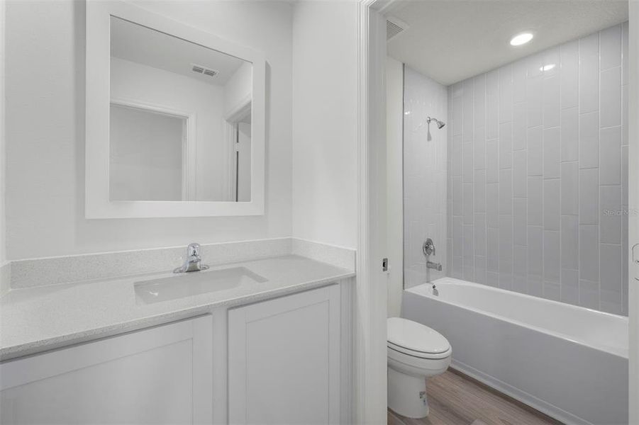 Furnished interior view inside a new home in Peach Crossings, Winter Haven (Image 9).