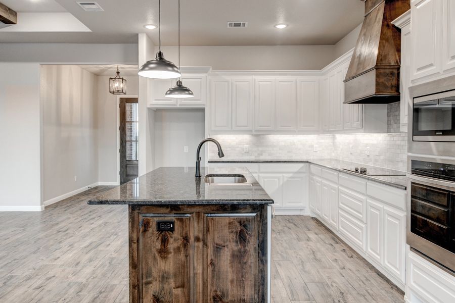 Representative furnished interior of a home built from the The Jackson by Doug Parr Custom Homes in Monarch Manor, Poolville (Image 8).