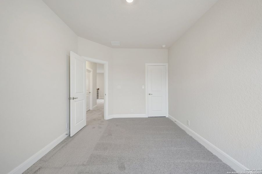 Spacious, unfurnished interior of a new home in Windsong - Reserve Series, Boerne (Image 20).