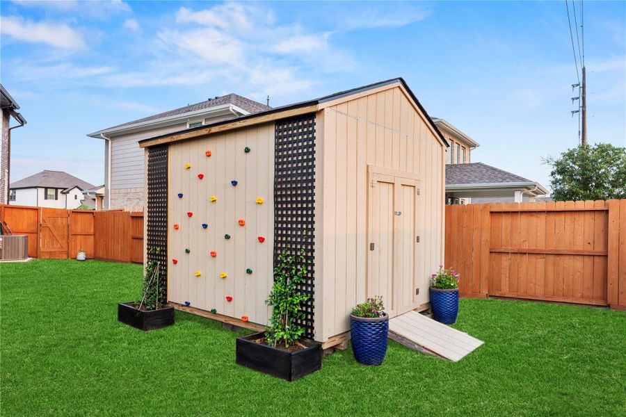 Storage shed for all of your outdoor and pool supplies.