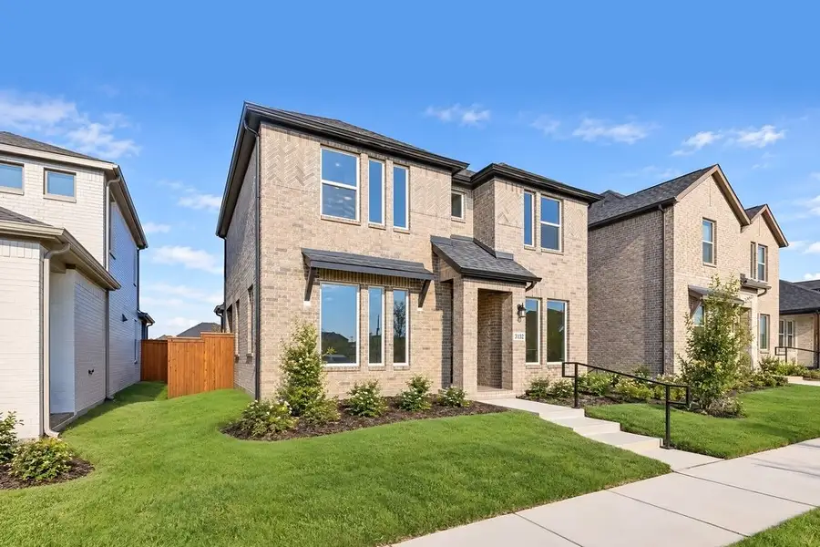 Front exterior of a new home in North Sky Celina, Celina, TX, highlighting curb appeal (Image 2). Front exterior of a new home in North Sky Celina, Celina, TX, highlighting curb appeal (Image 2).